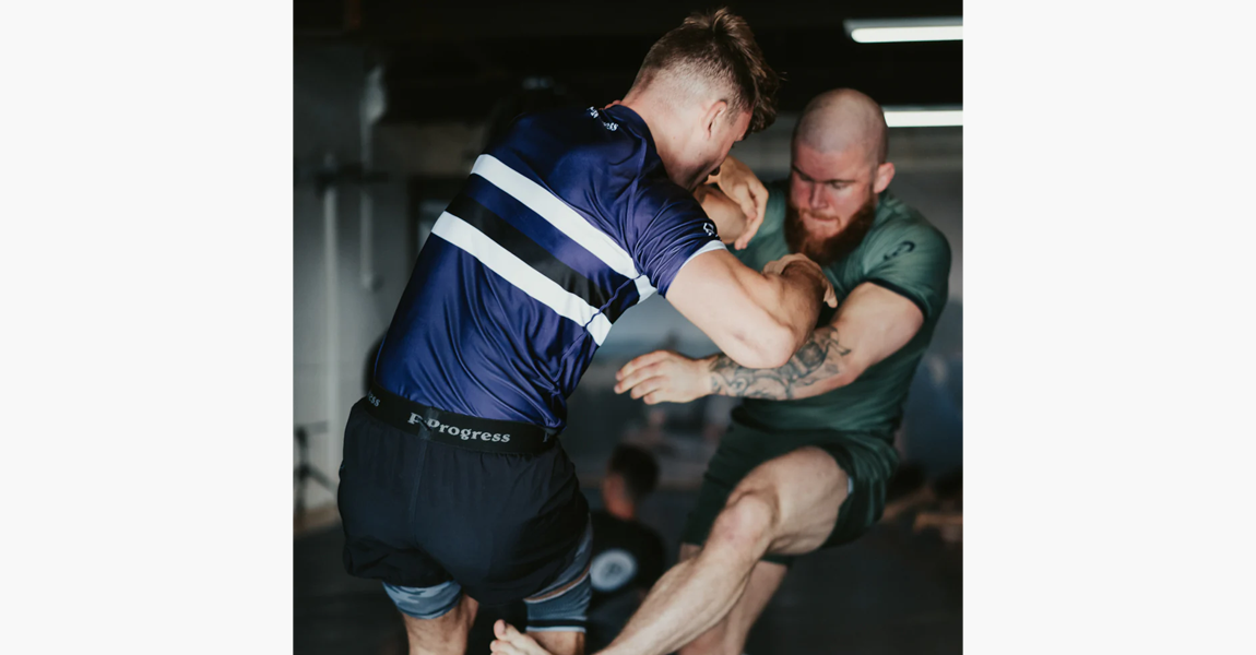 Athletes grappling no-gi in Mens Progress Fightwear