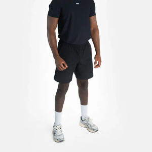 Model wearing Progress shorts, Made for both training and casual