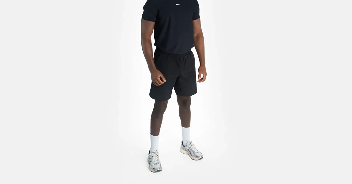 Model wearing Progress shorts, Made for both training and casual