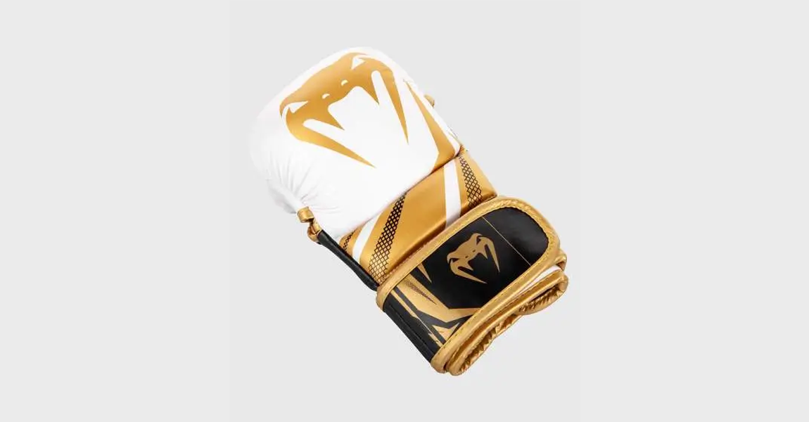 Venum Challenger 3.0 MMA sparring gloves in white, black and gold.