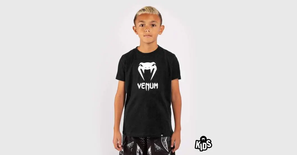 Venum Classic kids black t-shirt for martial arts and casual wear.