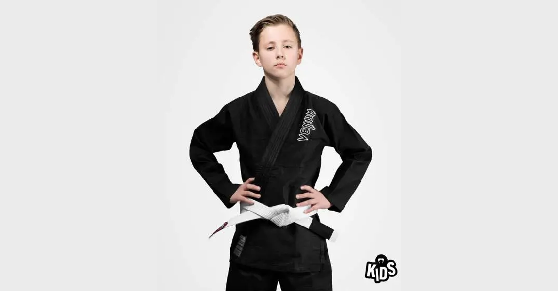 Venum kids Contender BJJ gi in black for jiu-jitsu training and competition.