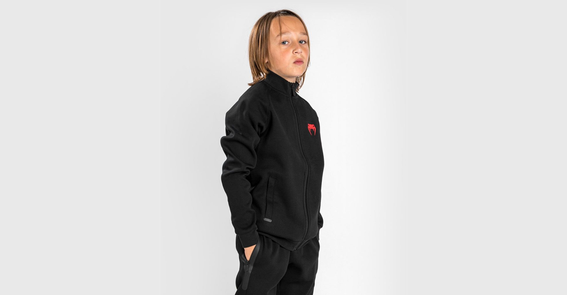 Venum Okinawa 3.0 kids jacket in black and red for martial arts and casual wear.