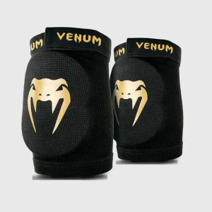 Venum Kontact black and gold elbow guard for MMA, Muay Thai and kickboxing protection.