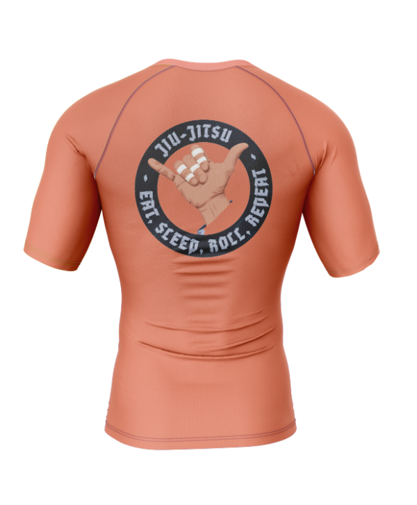 Rashtag Terracotta Shaka Jiu Jitsu rashguard with Eat Sleep Roll Repeat shaka graphic