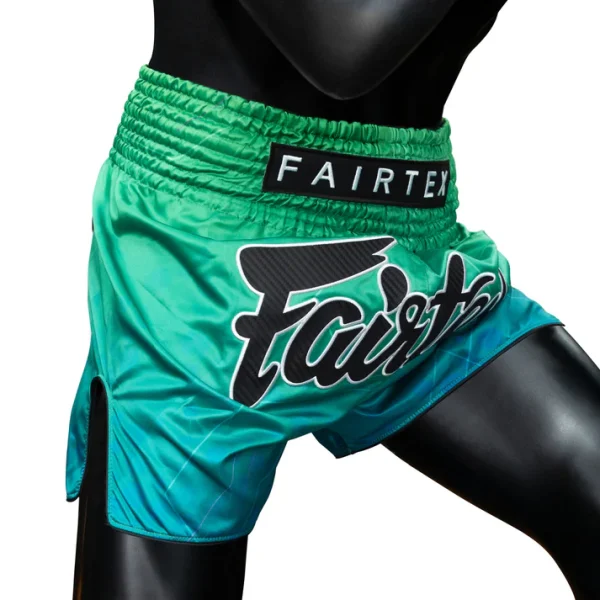 Angled model wearing Fairtex BS1953 Quantum Muay Thai Shorts