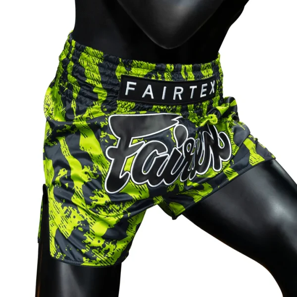 Angled model wearing Fairtex BS1955 Raptor Muay Thai Shorts