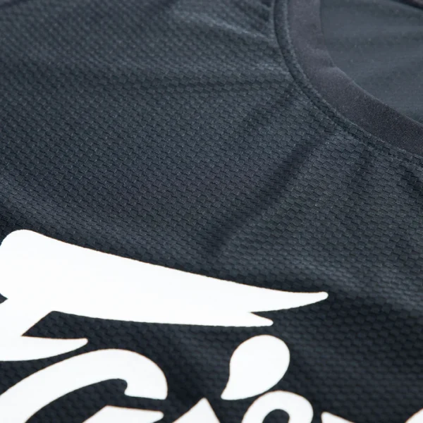 Fairtex TST181 Black Dry Fit T Shirt close up fabric detail high quality stitching