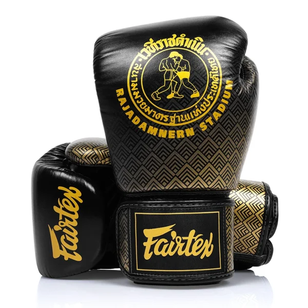 Fairtex Rajadamnern Premium Boxing Gloves in Black – front view Fairtex Rajadamnern Premium Boxing Gloves in Black/Gold – front view